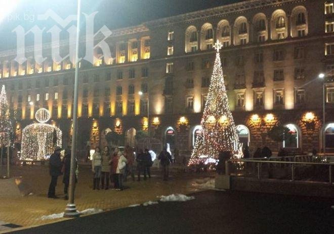 Заря в центъра на София пада върху главите на хората