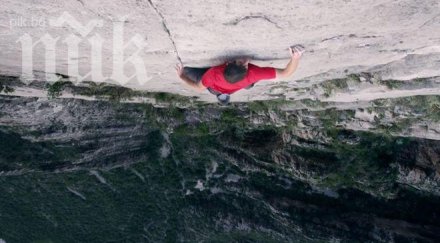лудост мъж изкатери 457 метрова скала без осигурителна екипировка видео