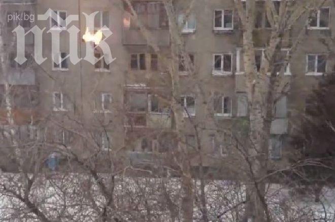 Мъж се запали и скочи от покрива на 5-етажна сграда (видео)