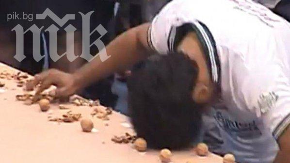 Пакистанец чупи 155 ореха с главата си само 1 минута! (ВИДЕО)