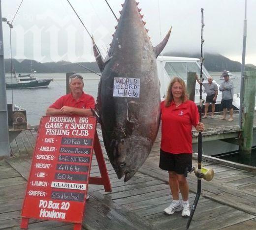 Жена улови риба тон с тегло 411 кг
