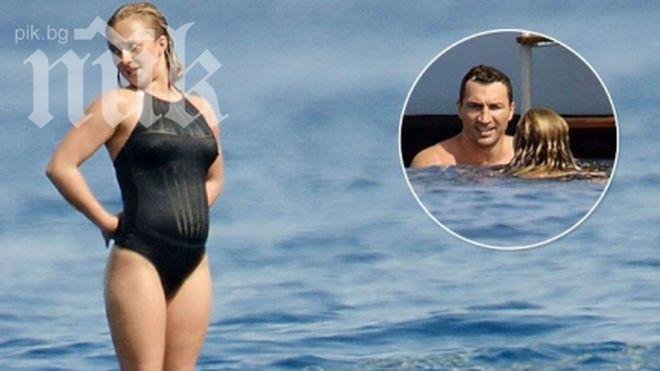 Папараци спипаха Кличко и бременната му приятелка (снимки)