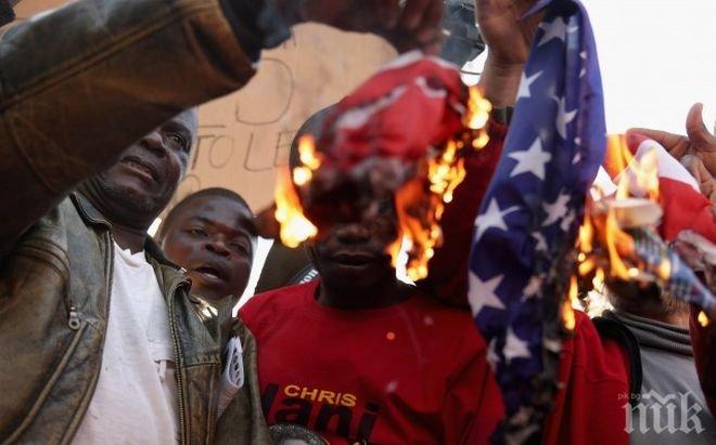 Демонстранти в бразилския град Натал изгориха знамето на САЩ преди мача с Гана