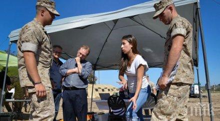 войнишки ботуши зареждат електроника снимка