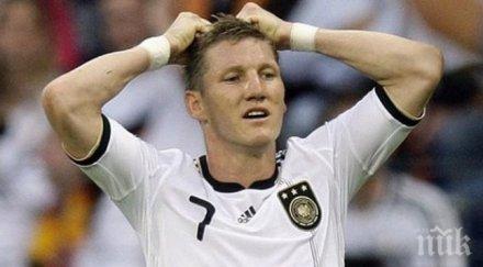 швайнщайгер слага капитанската лента германия