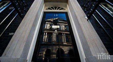 британски министър подаде оставка заради компрометиращи снимки