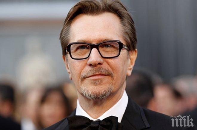 Гари Олдмън отново се развежда 
