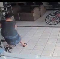 Уникално! Жена открадна телевизор, като го скри под полата си! (видео)