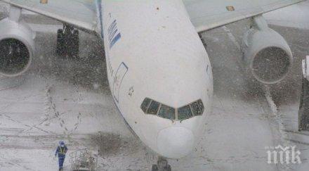 силен снеговалеж отмени полета токийските летища нарита ханеда