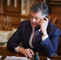 Порошенко проведе телефонен разговор с Меркел и Оланд 