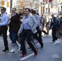 Мъже обуват високи токчета, изправят се срещу насилието
