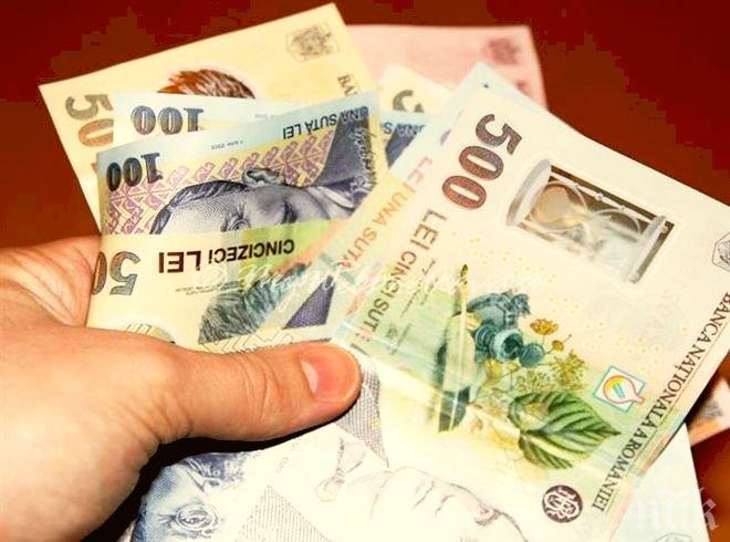 Разследваният за корупция финансов министър на Румъния не подава оставка