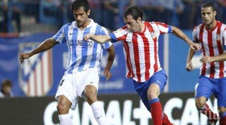 атлетико мадрид можа победи малага торес вкара гол грешната врата