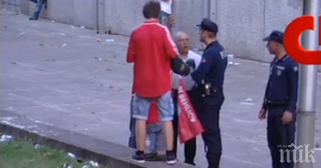 Жестоко! Полицай преби с палка футболен фен пред очите на сина му (видео 18+)