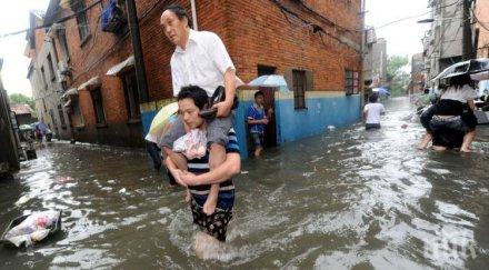 воден китай души загинаха наводненията китай
