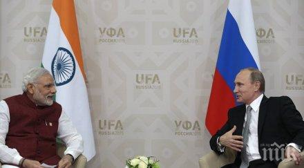 путин обеща индийския премиер пробва йога