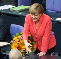 Меркел получи мандат за преговори и цветя от Шойбле за рождения си ден