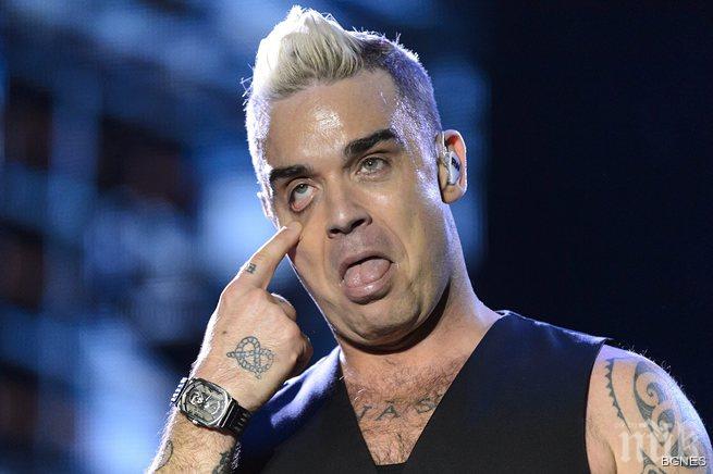 Роби Уилямс ляга с българско момиче на плажа 