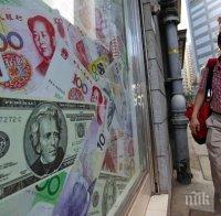 Китай ще изчислява курса на юана към долара по нов метод