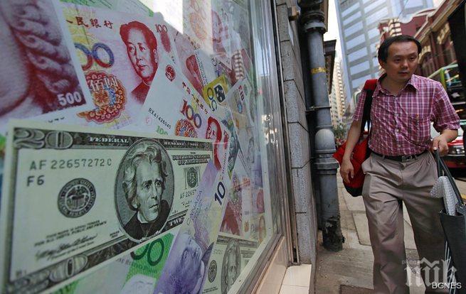 Китай ще изчислява курса на юана към долара по нов метод