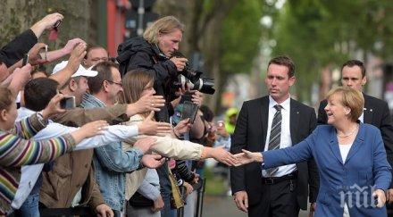 меркел посети бежанския лагер хайденау