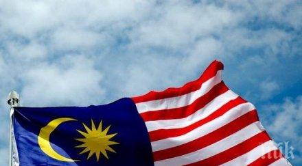 член управляващата партия малайзия съди премиера подкуп