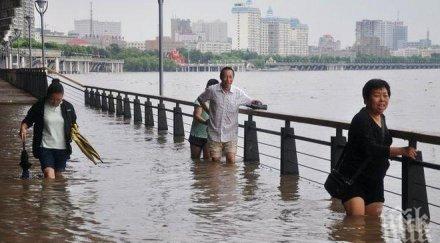 трима души загинаха водят изчезнали време наводненията япония