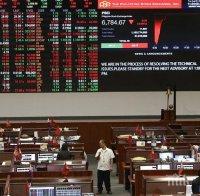 Китайските акции поевтиняха леко с отварянето на борсите