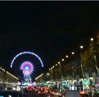 Заради атентатите: Запалиха коледните светлини в Париж без тържества