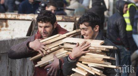 германски министър предстои гигантска бежанска вълна млн души