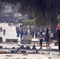 В Тунис при сблъсъци с демонстранти загина един полицейски служител