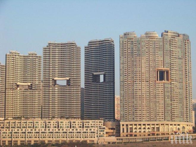 Небостъргачите в Хонконг се строят с дупка във фасадата. Вижте защо!