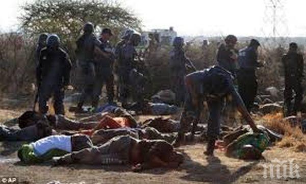 Откриха 17 застреляни в главата миньори, заровени в общ гроб 