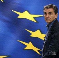 Гръцкият финансов министър: Страната изпълнява поетите задължения по дълга си
