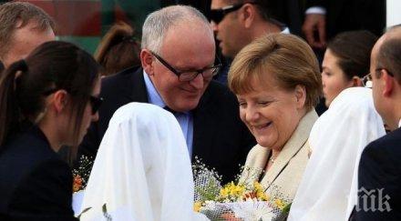 российская газета показаха ангела меркел рекламен бежански лагер