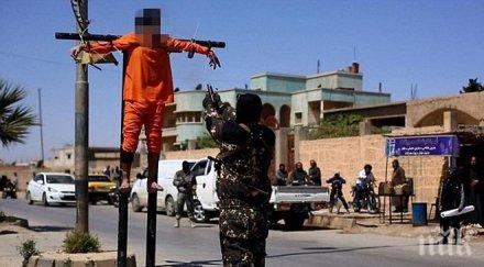 зверство ислямска държава великден разпънаха кръст двама шпиони застреляха главите 1000 души снимки