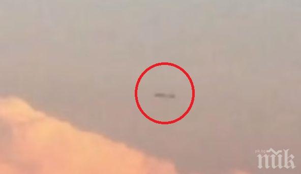 Пълен шаш! НЛО с форма на цигара прелетя над американски град (ВИДЕО)