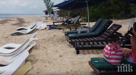 вятърът носи студен фронт дъжд гърмежи плажът отлага кратко