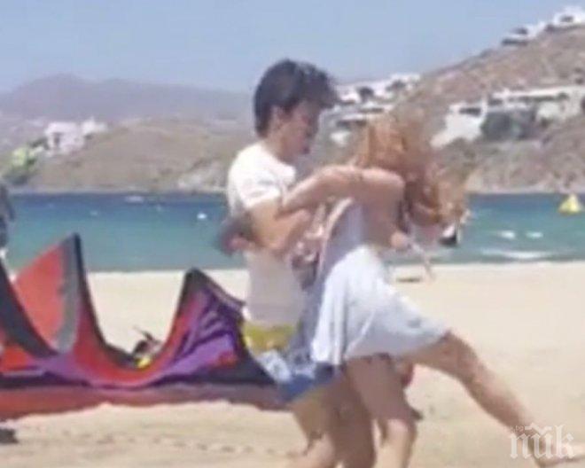 УНИКУМ! Бой между Линдзи Лоън и гаджето й на гръцки плаж (ВИДЕО)