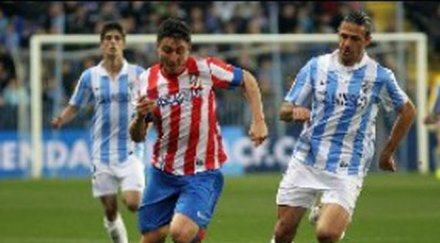 атлетико изпусна малага остава далеч барса