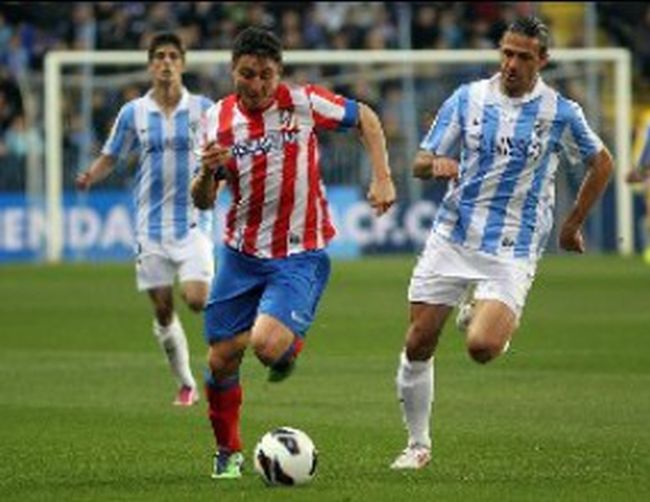 Атлетико (М) изпусна Малага и остава далеч зад Барса