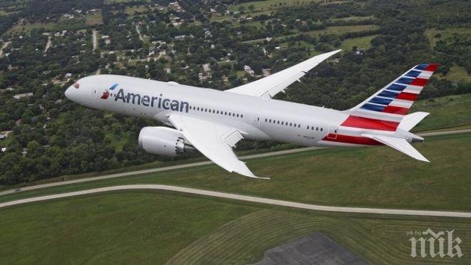 Буен пътник приземи самолет на Американ еърлайнс