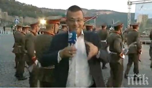 Смях в ефир! Репортер се набута между шамарите навръх празника, едва не го матираха с дръжка на знаме 