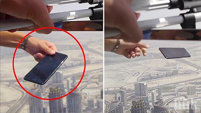 КРЪГЪЛ ИДИОТ! Блогър провери IPhone 7 Plus, като го хвърли от най-високата сграда в света (ВИДЕО)