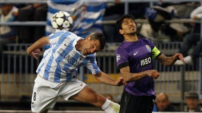 Малага отстрани десет от Порто и е на четвъртфинал в ШЛ