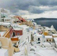 ГЪРЦИЯ ЗАМРЪЗНА! Сняг покри най-слънчевите острови Санторини и Родос