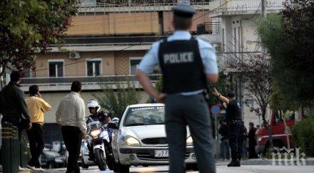 стрелба атина полицай ранен офис