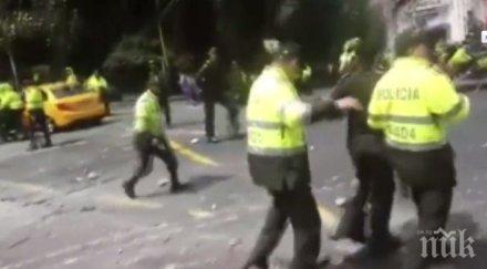 екшън колумбия полицай убит бяха ранени време корида видео