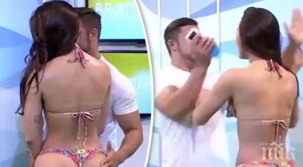 шоу водещ пусна ръка манекенка оскъдни бикини получи шамар видео