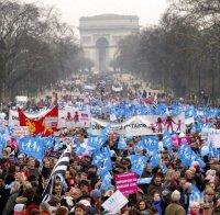 Коктейли „Молотов“ и сълзотворен газ – протестите в Париж прераснаха в сблъсъци с полицията

